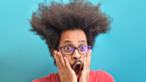 black man looking surprised