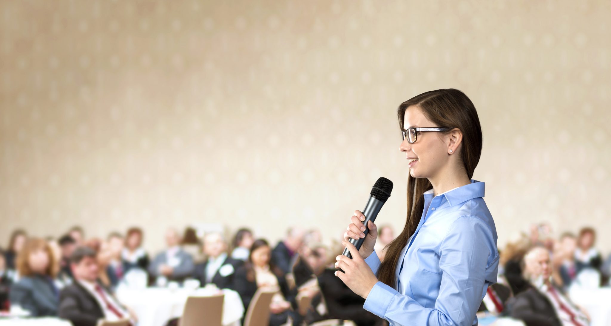 Woman presenting at conference