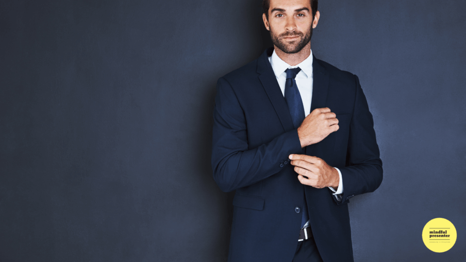 Man in suit and tie smiling