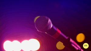 microphone against a colourful backdrop