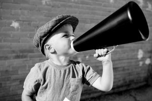 young boy with megaphone