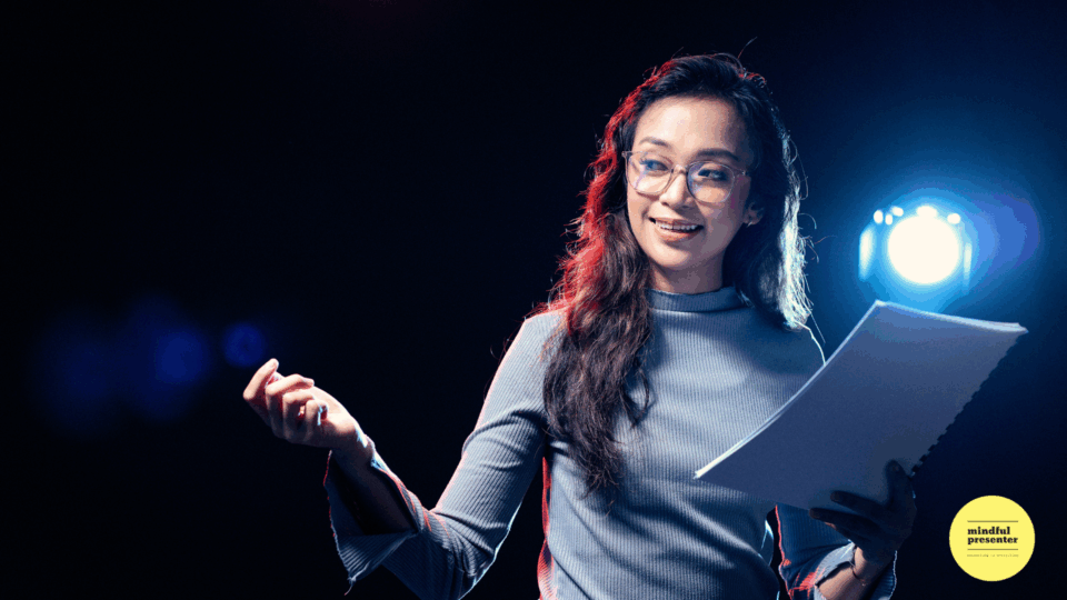 Woman presenting holding notes