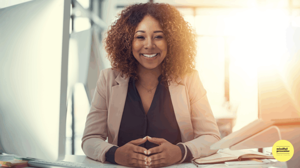 Woman seated and smiling