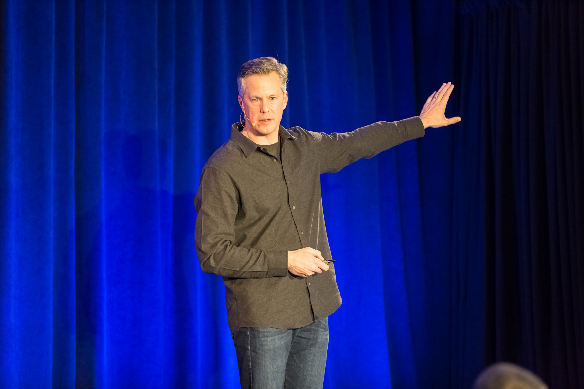 Man presenting on stage