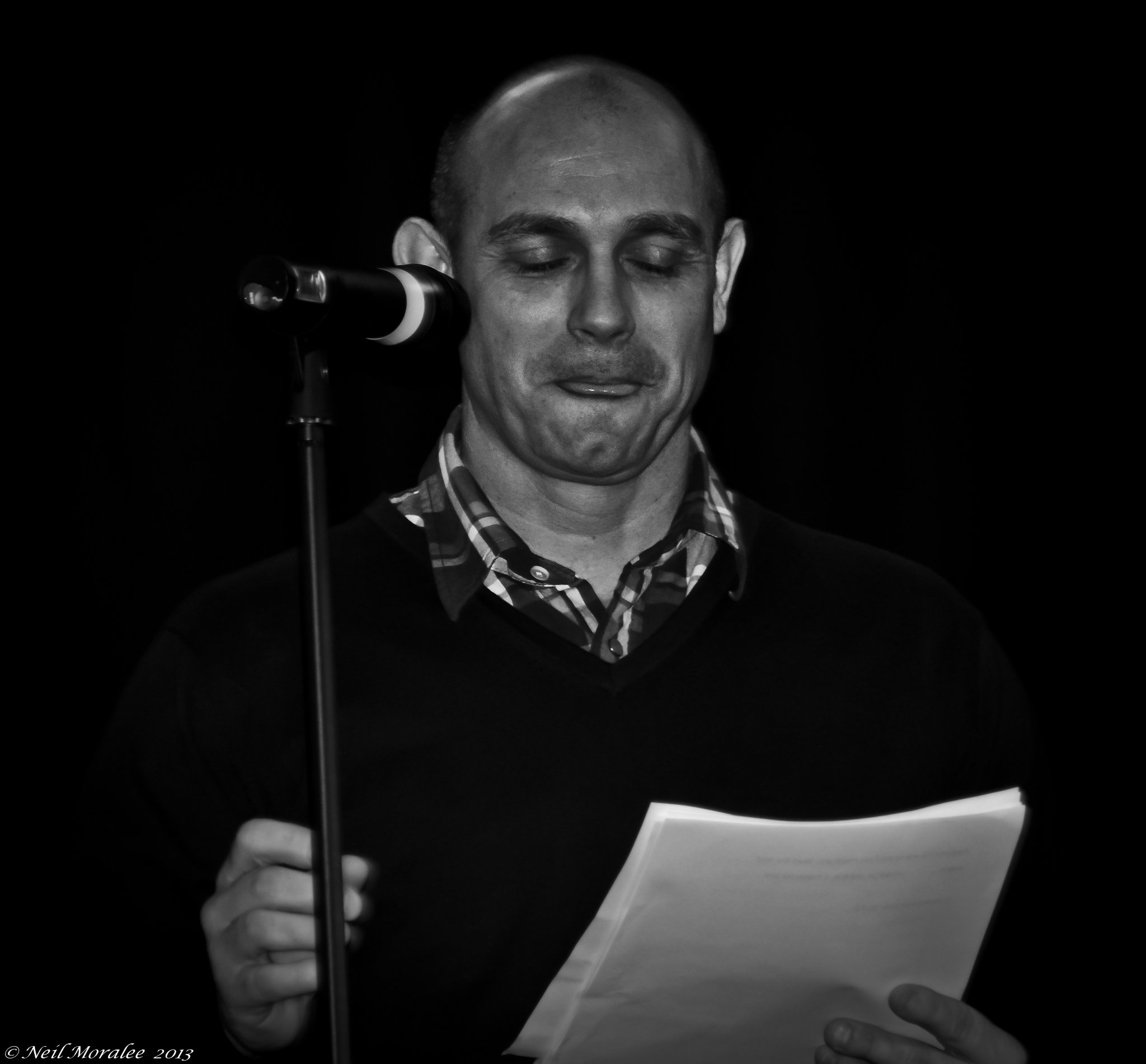 fear1 man reading script using microphone