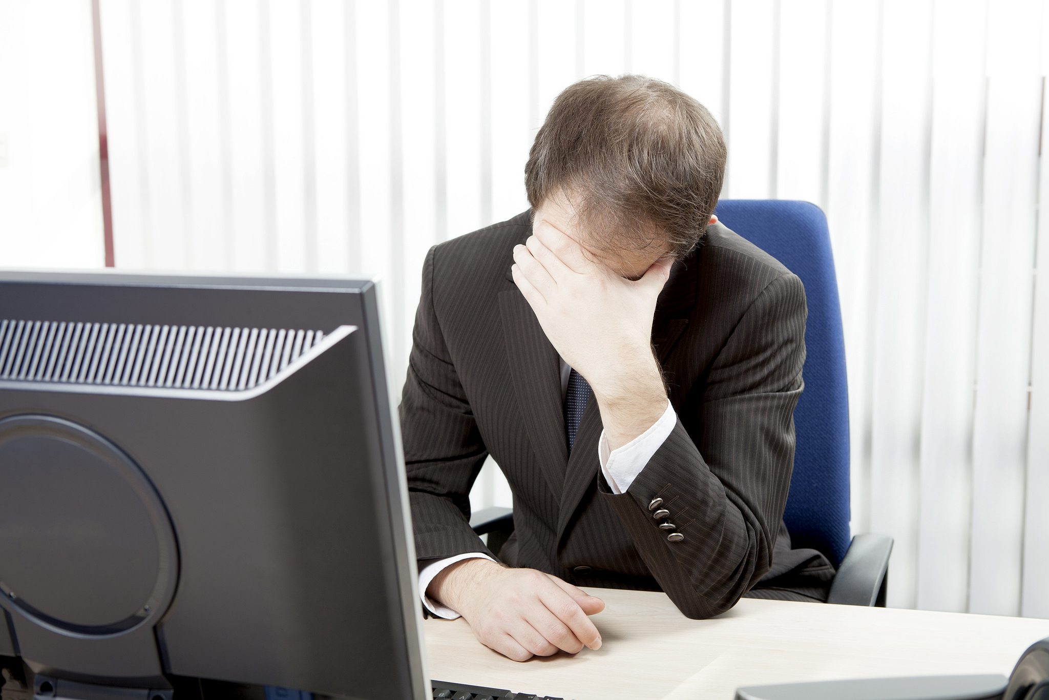 Man sitting in front of computer