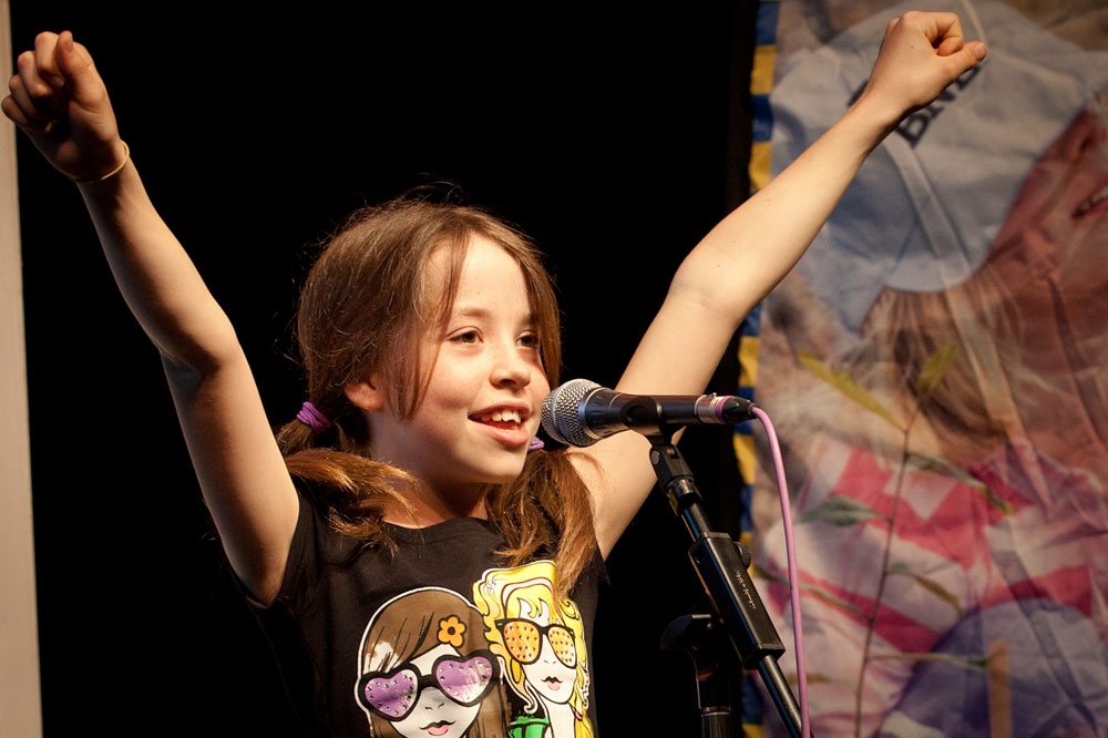 Young girl presenting