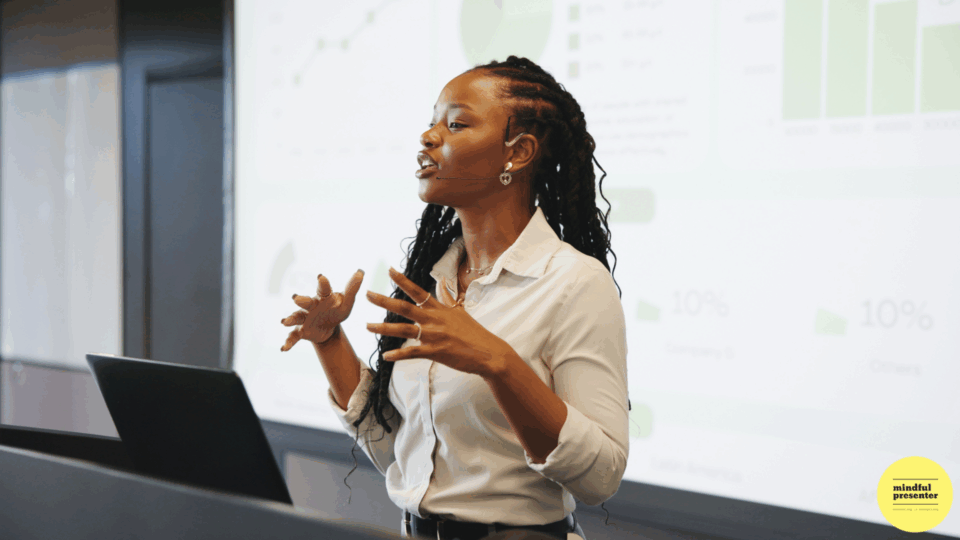 Woman presenting using open hand gestures