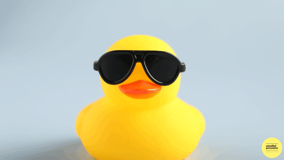yellow rubber duck wearing sunglasses