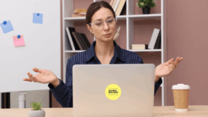 woman presenting facing here laptop