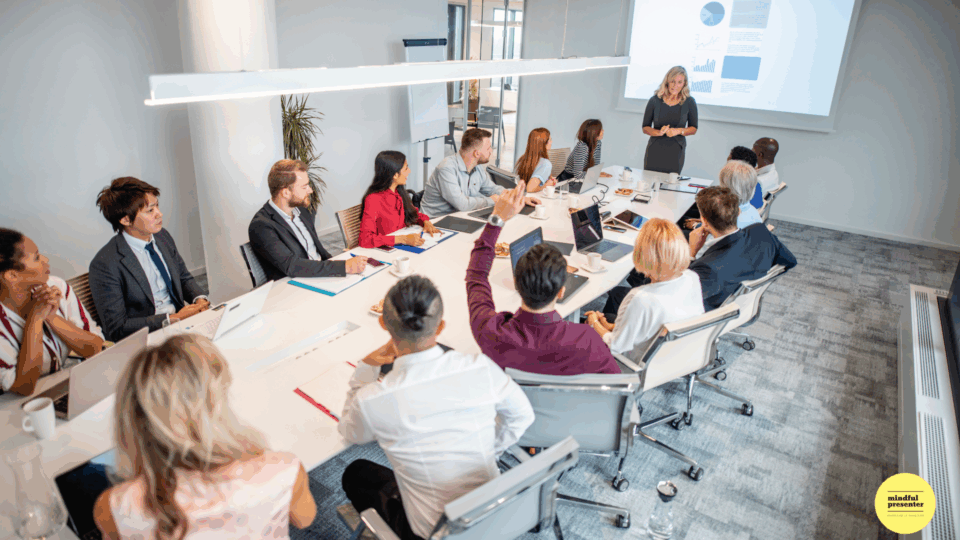woman presenting in meeting room