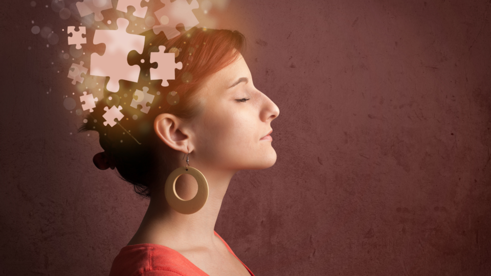 woman with puzzle coming out of head