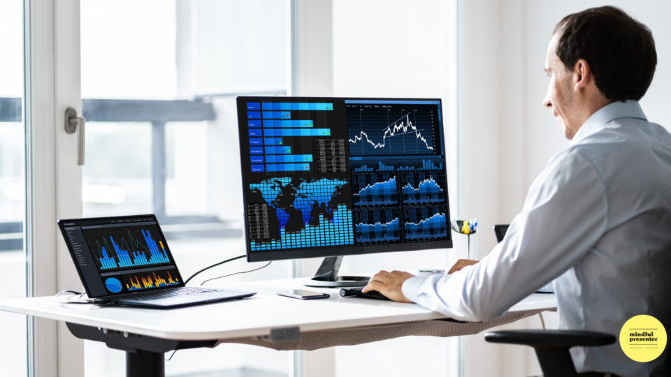 man looking at data on a sceen