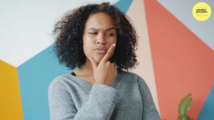 A woman looking doubtful