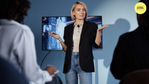 woman presenting to audience