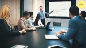 Man presenting a chart at a meeting