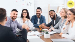 People smiling in a meeting